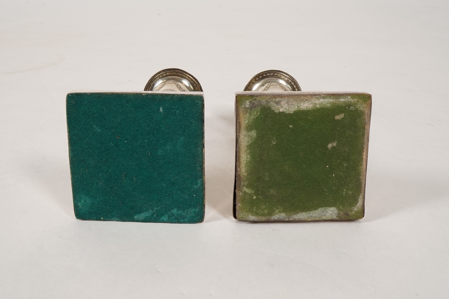 A pair of Victorian silver candlesticks, with fixed sconces, by Henry Wilkinson & Co